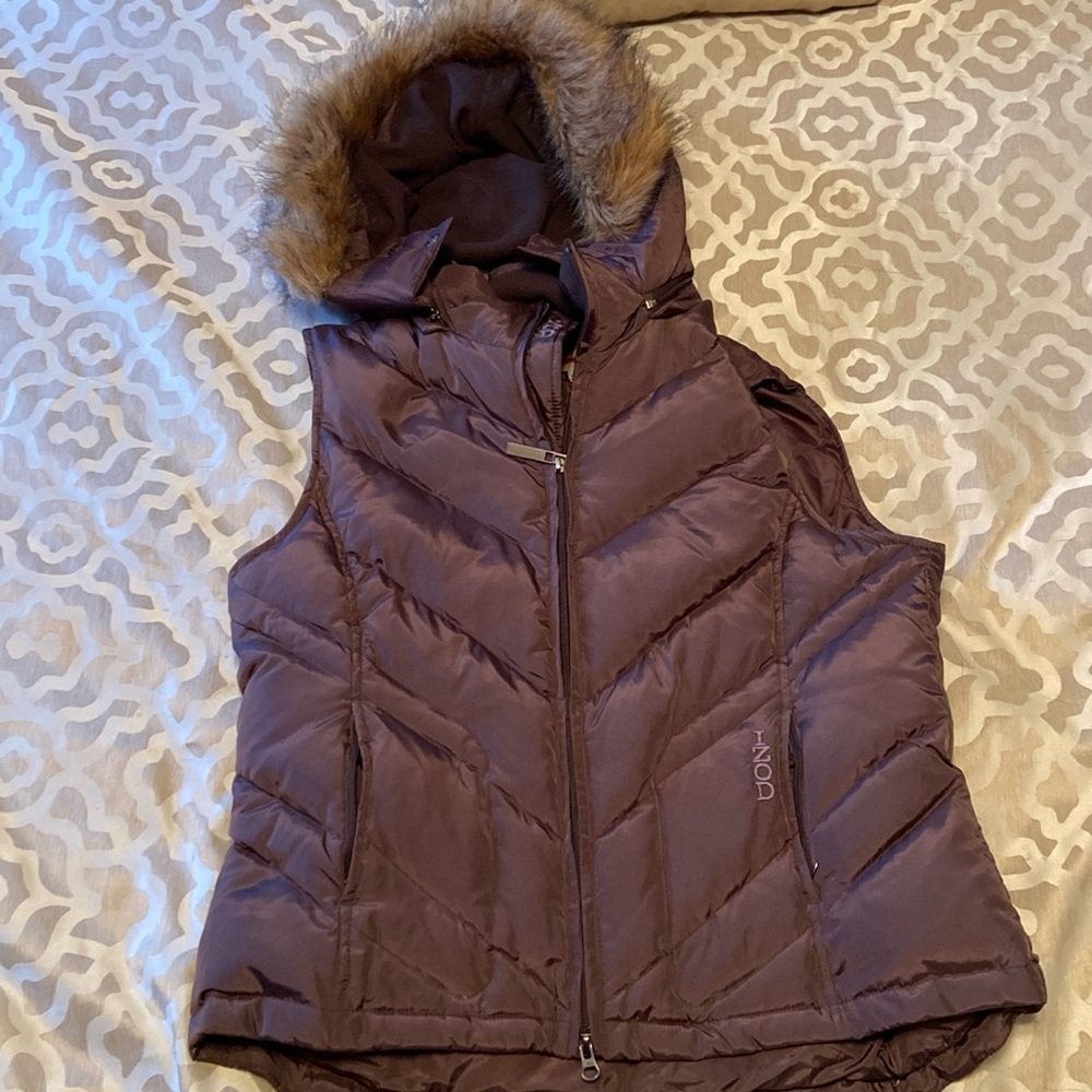 IZOD puffer vest with fleece lined fake fur hood